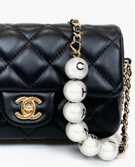 chanel shopping bag pearl|chanel bag with pearls strap.